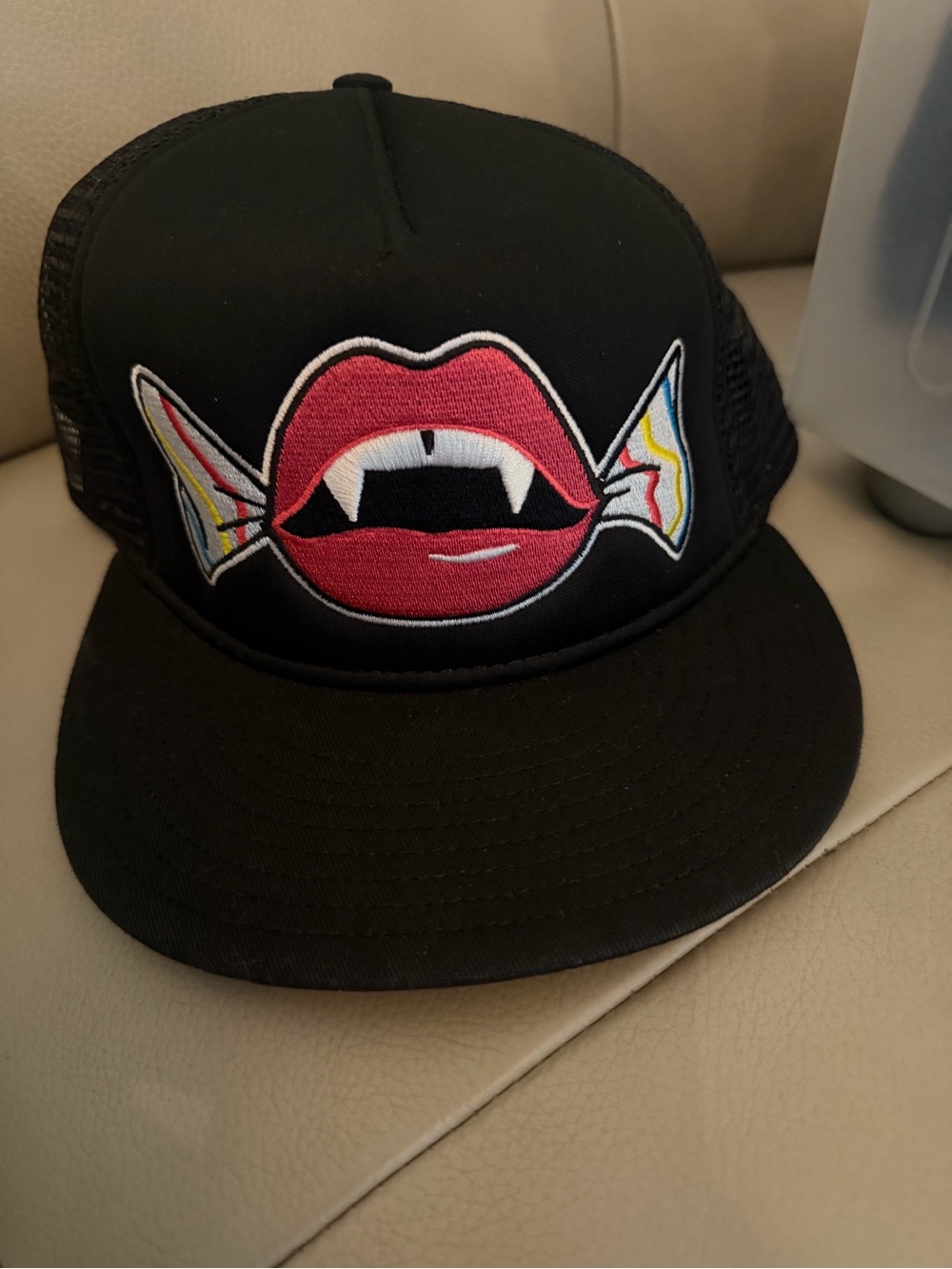 New Era Black and White Trucker Cap with Mesh Interior